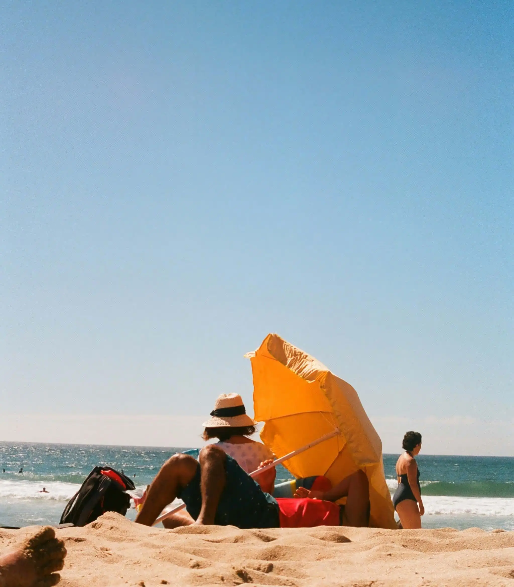 Couple enjoying retirement lifestyle by the ocean, symbolizing wealth tax planning and retirement tax planning in Brandon.