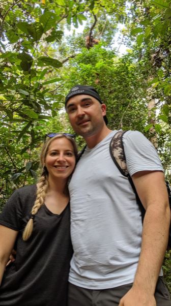 Couple standing together in forest – enjoying lifestyle freedom through wealth planning