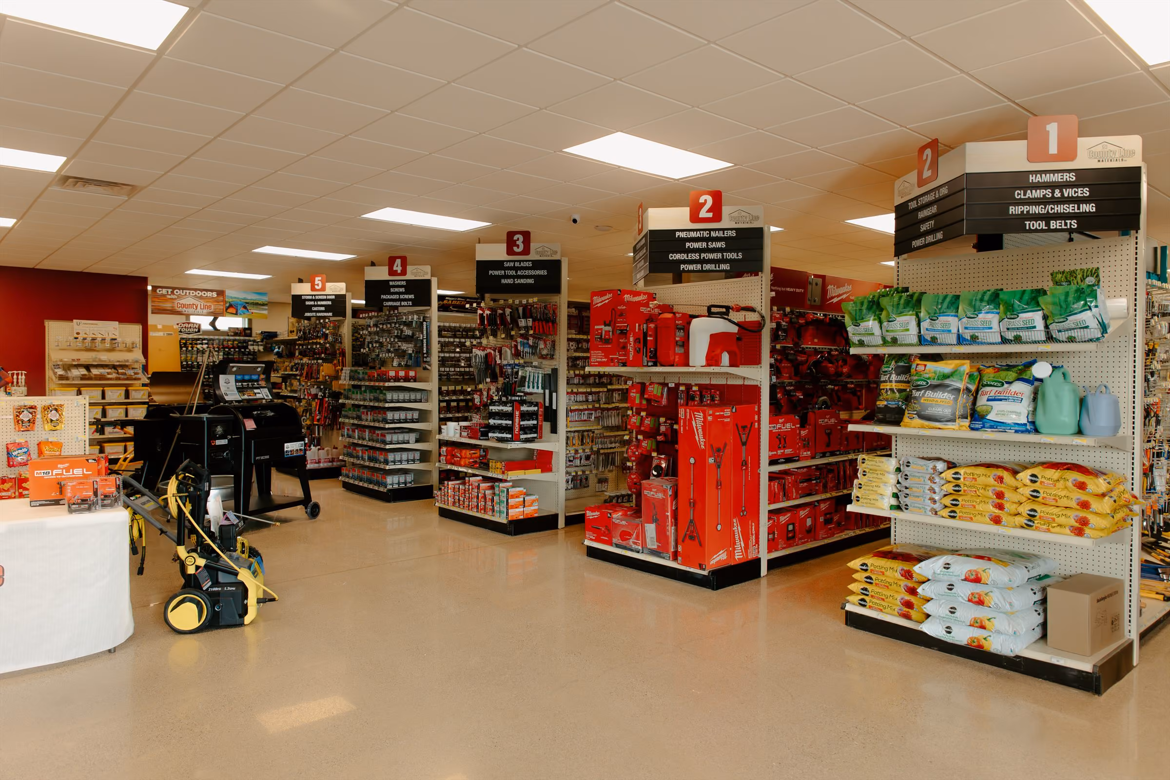 Product aisles at the County Line Materials hardware store