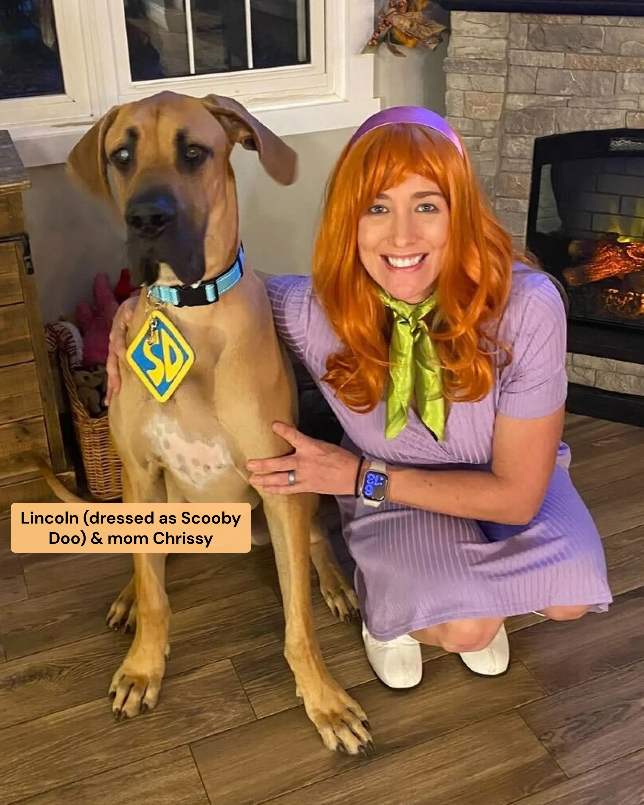A woman and her dog dressed in matching Scooby-Doo Halloween costumes.