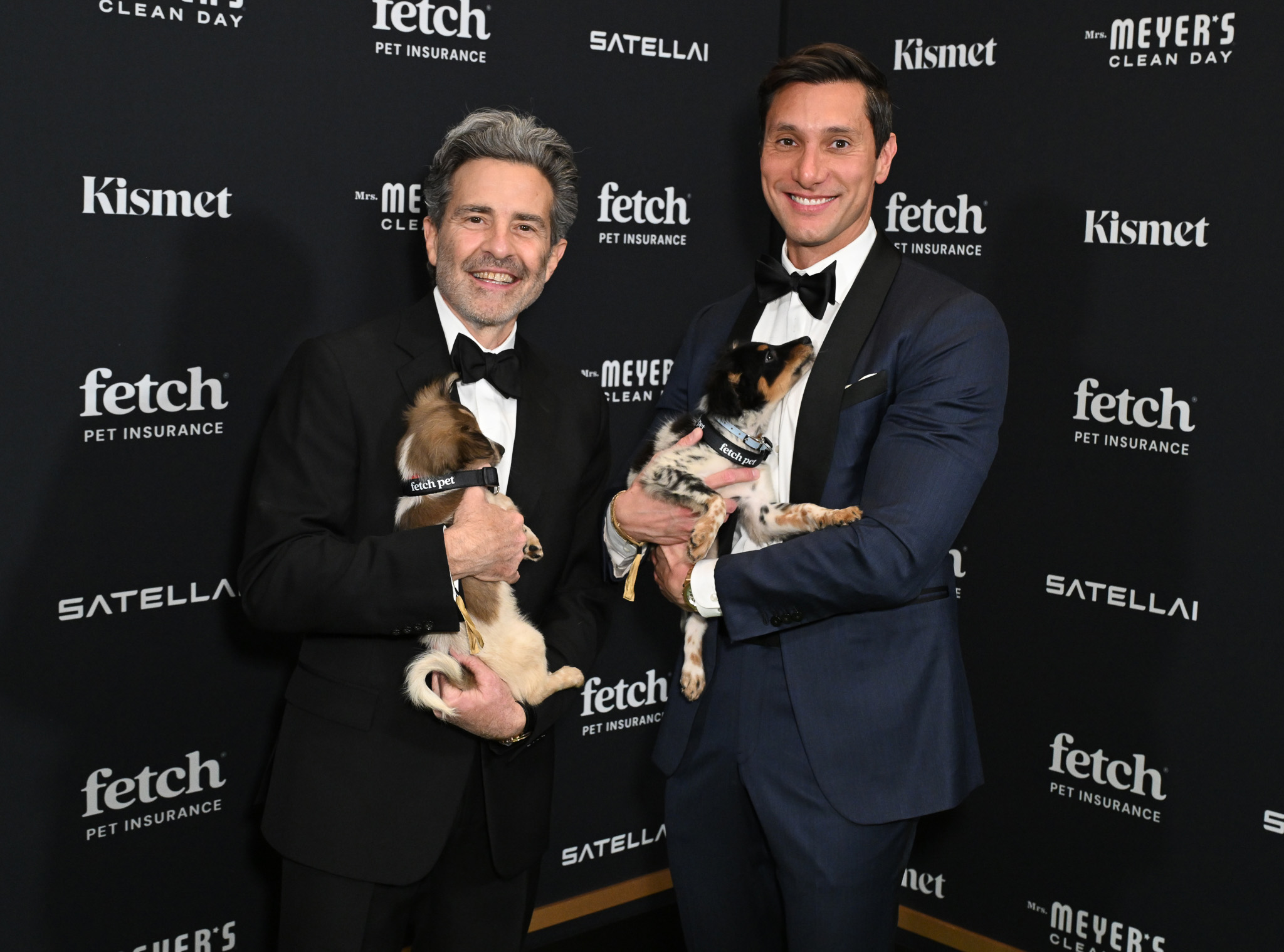 Paul Guyardo President & CEO of Fetch Pet Insurance and Mathé Young Mosny Co-founder of Kismet pose with Rescue Pups from North Shore Animal League America at the 2025 Fetch Pet Gala.