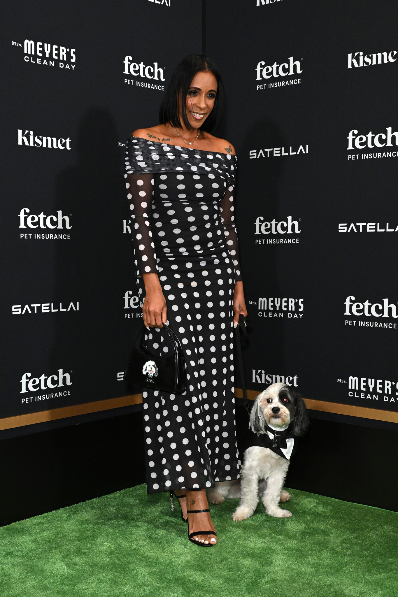 Martha Luna poses with Rescue Pup from North Shore Animal League America.