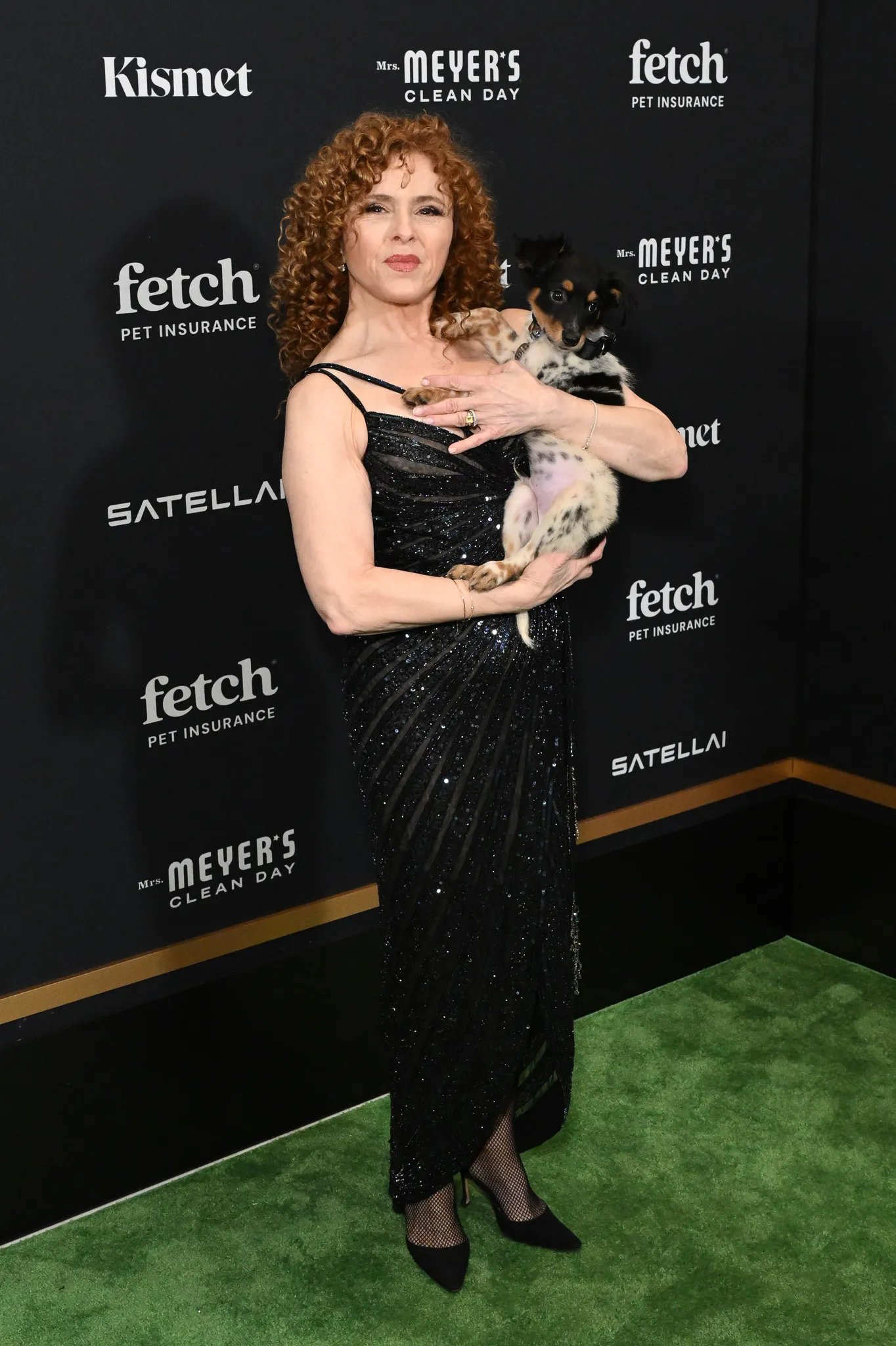 Bernadette Peters poses with Rescue Pup from North Shore Animal League America at the Fetch Pet Gala.