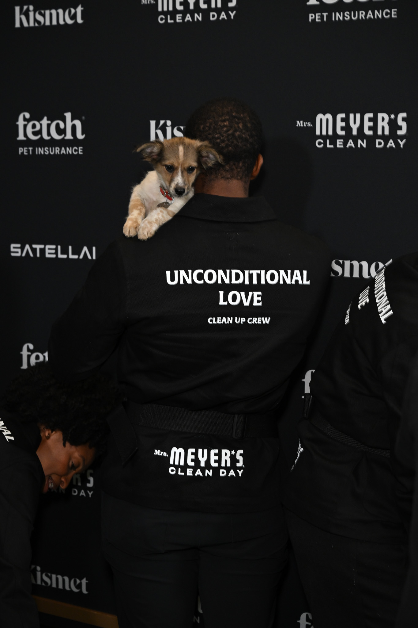 Mrs. Meyers Clean Day staff poses with rescue pup from North Shore Animal League America at the 2025 Fetch Pet Gala.