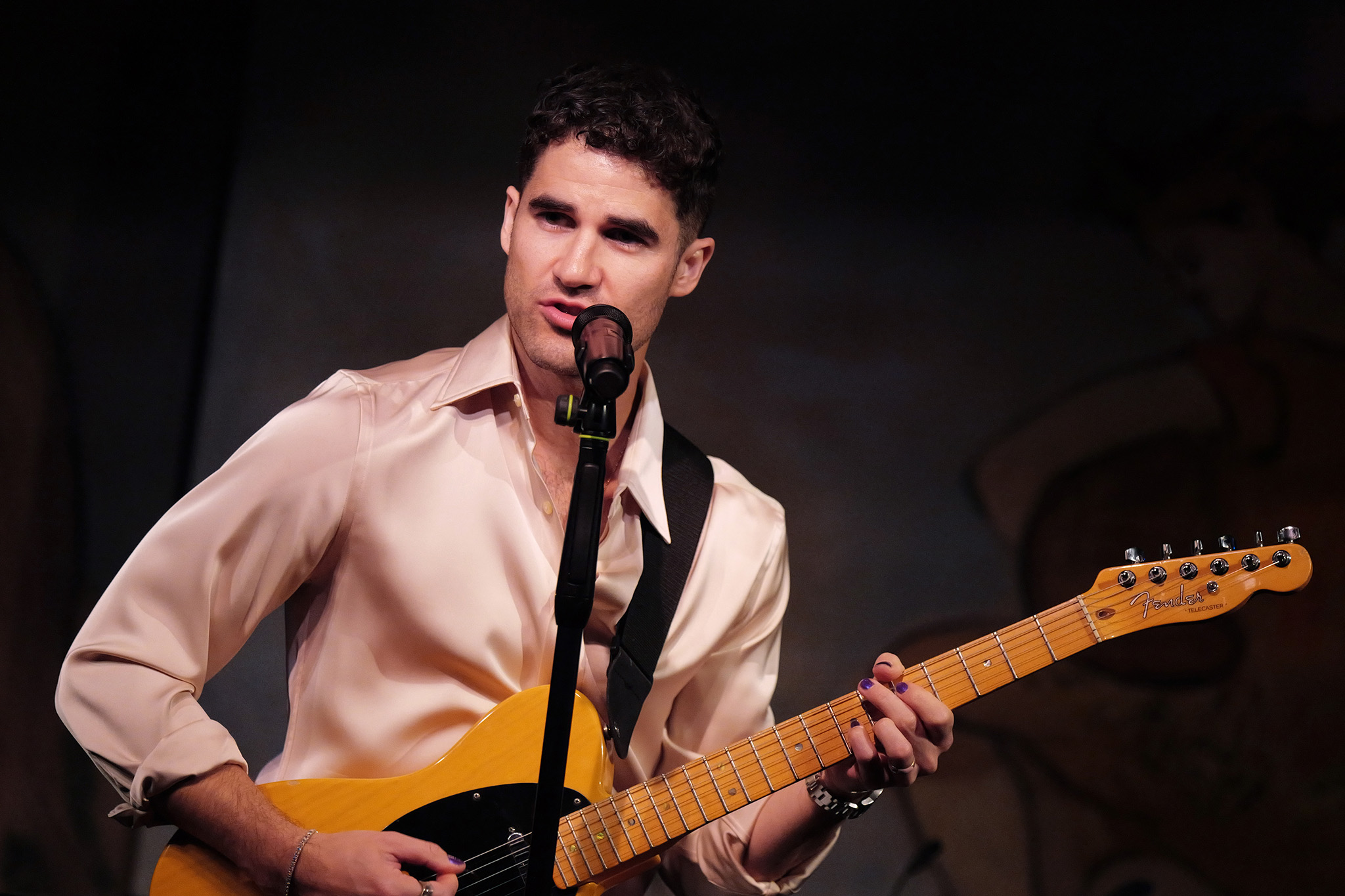Darren Criss performs at the 2026 Fetch Pet Gala.