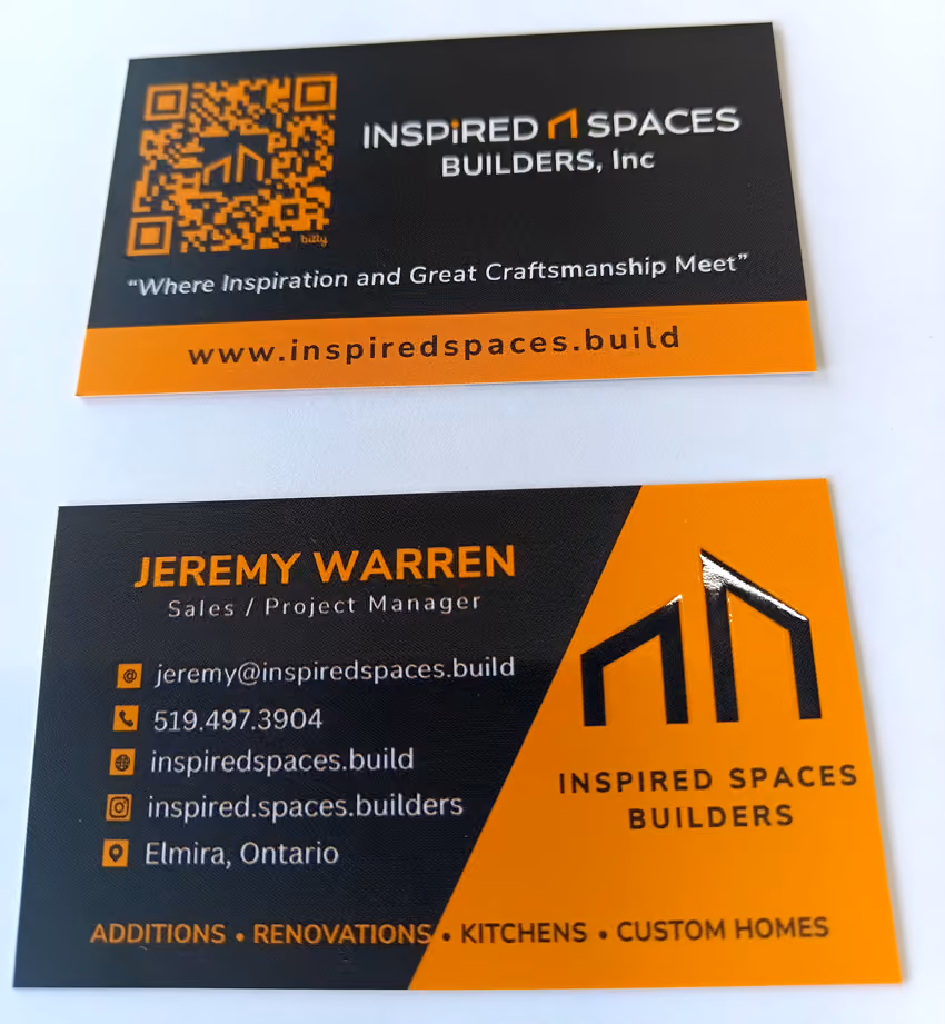 Photo of Inspired Spaces Builders business card - front and back - with spot UV