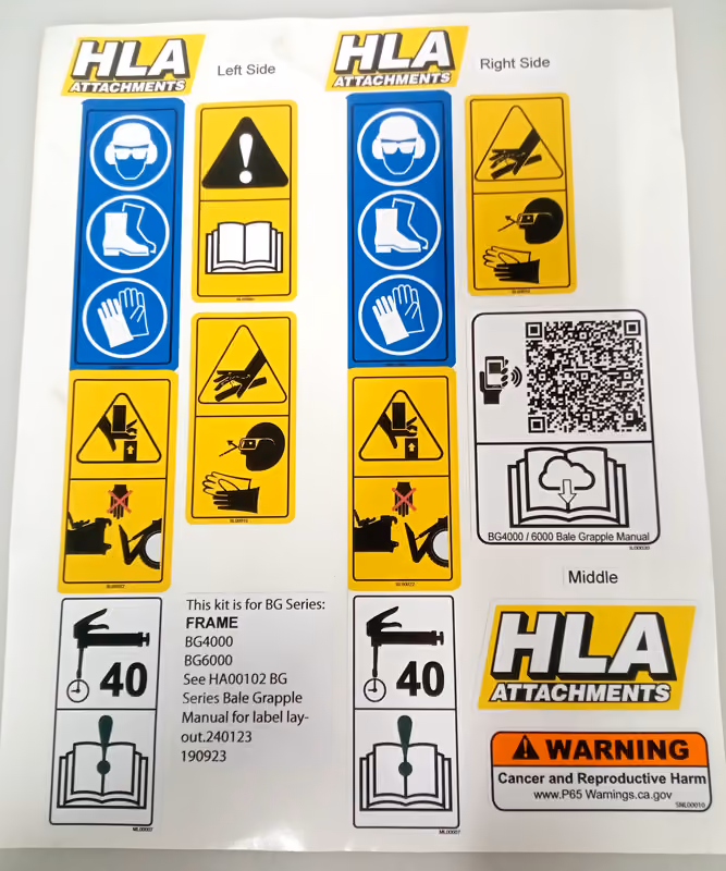 Photo of a variety of labels on a sheet : warning labels, instruction labels, safety labels, HLA Attachments branding