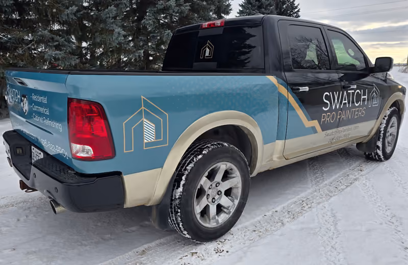 Photo of a pick up truck with Swatch Pro Painters wrap branding