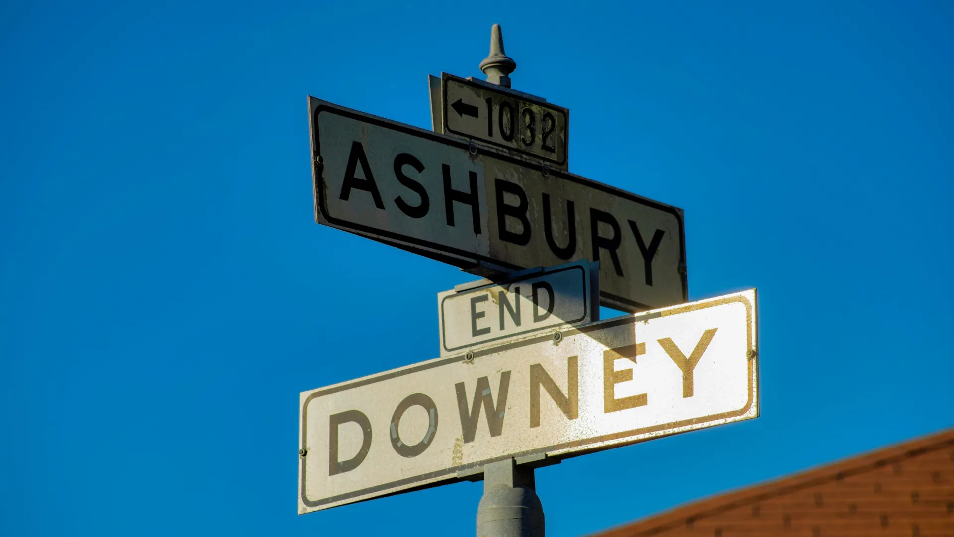 Injured pedestrian receiving assistance after traffic accident in Downey