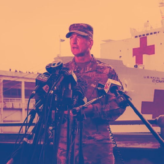 Military official giving a press briefing.