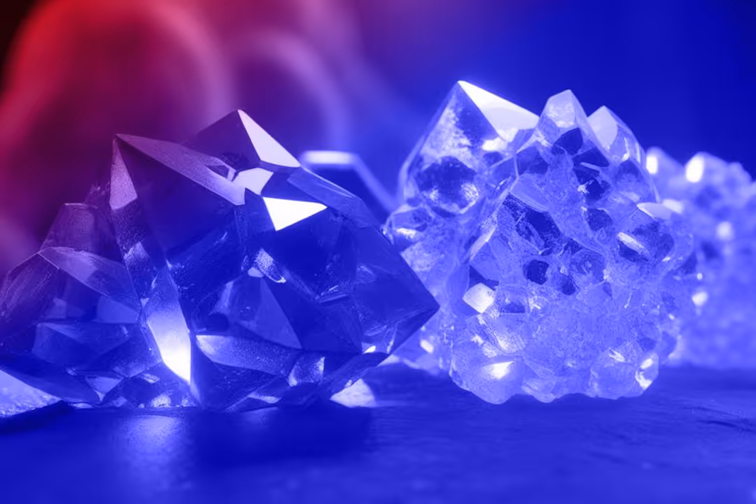 A red and blue abstract image of molecules in a microscope. 