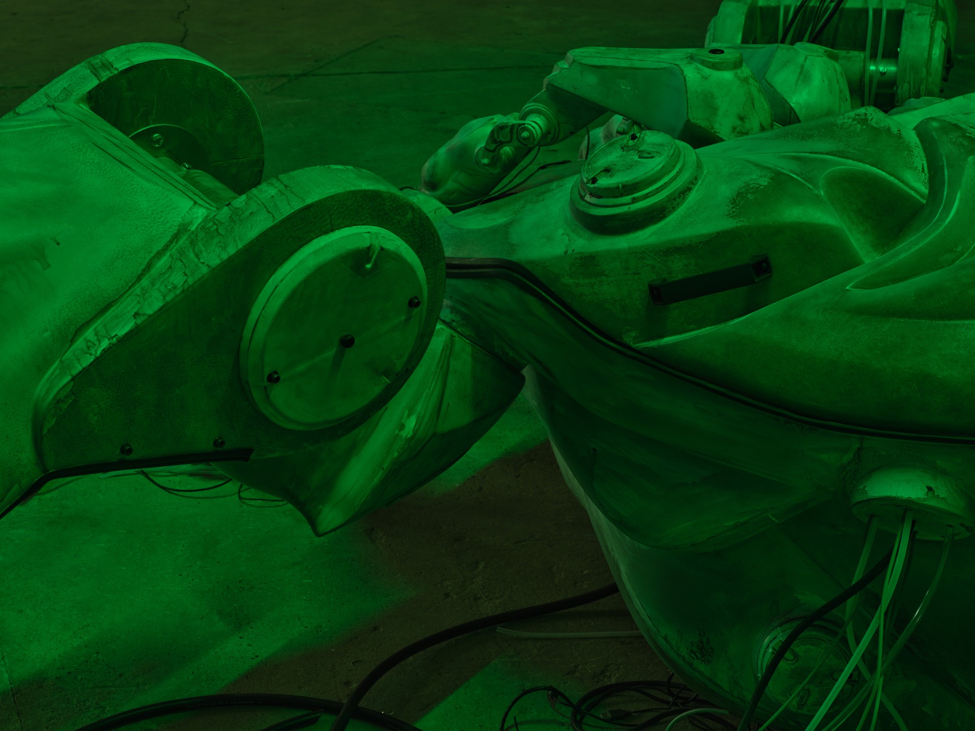 Detail of Mecha (protective suit) by Davide Allieri, translucent fibreglass surface with internal cavity visible, 2026