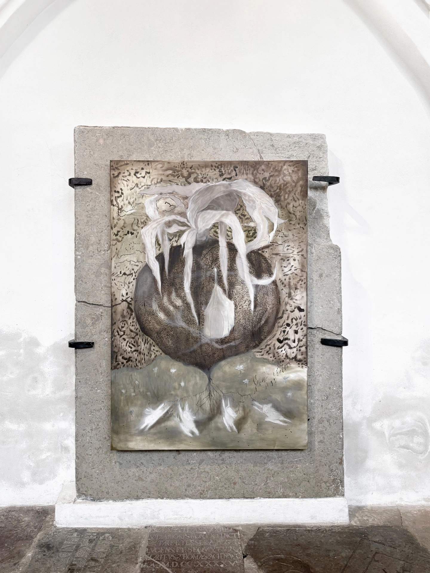 Angelika Puff, Sanctuary, a large oil and modeling paste painting of a pale feathered mass sprouting long filaments, mounted on a slab of raw granite in Galeria EL.