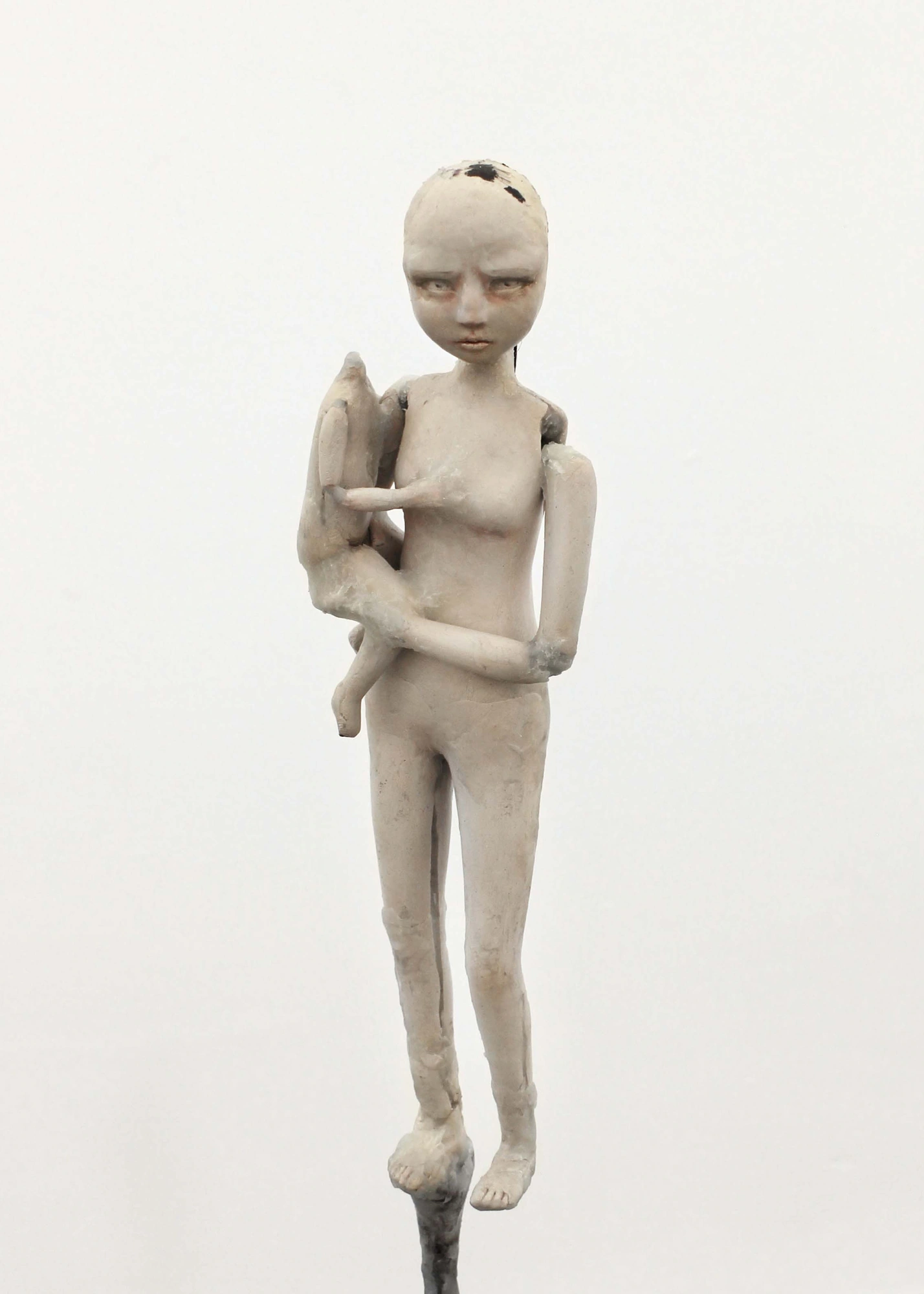 Alicia Bilbao, Weaning, 2026. Epoxy clay, beeswax, human hair, metal, oil paint