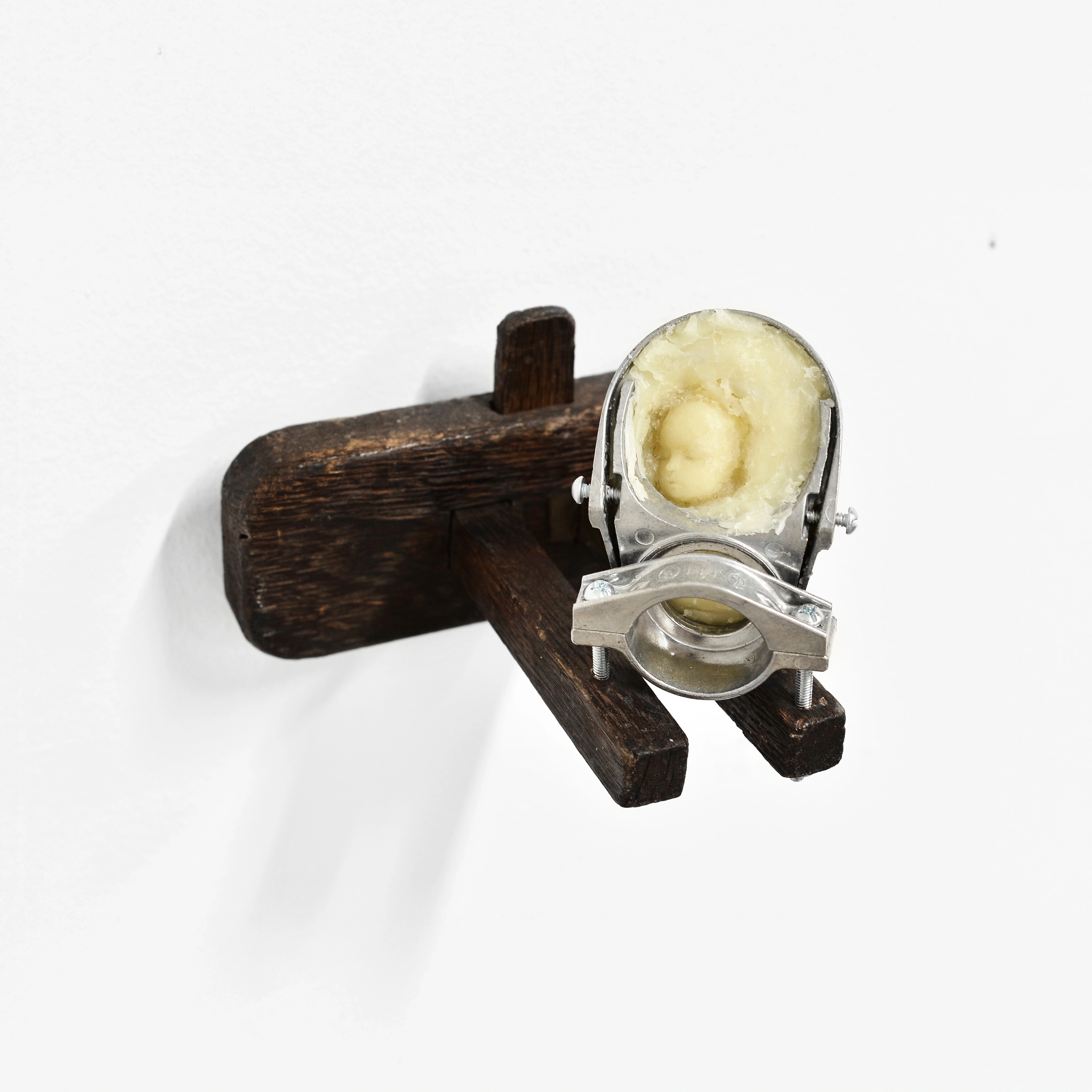Alicia Bilbao, Echo, 2026. Beeswax, steel, wood