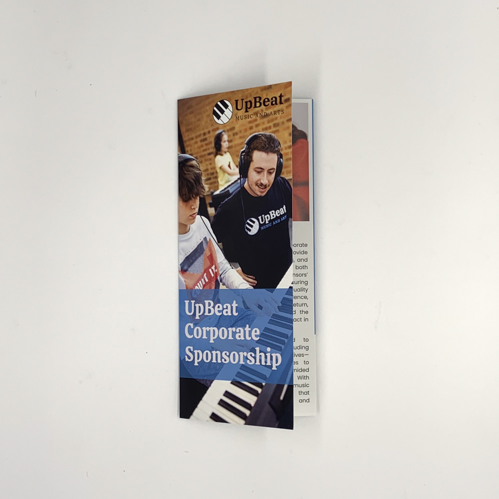 Image of the front cover of a closed trifold for Upbeat Music School