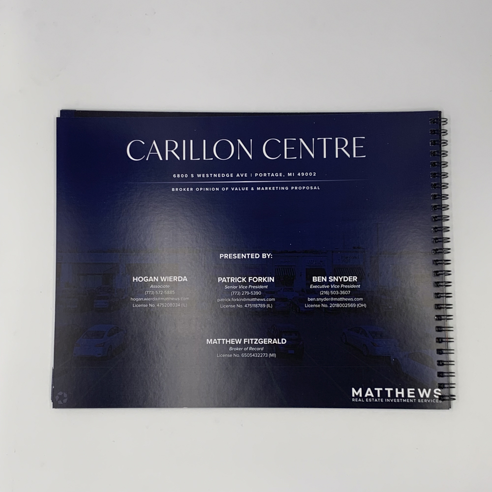 Image of the back cover of a wirebound booklet for a real estate presentation