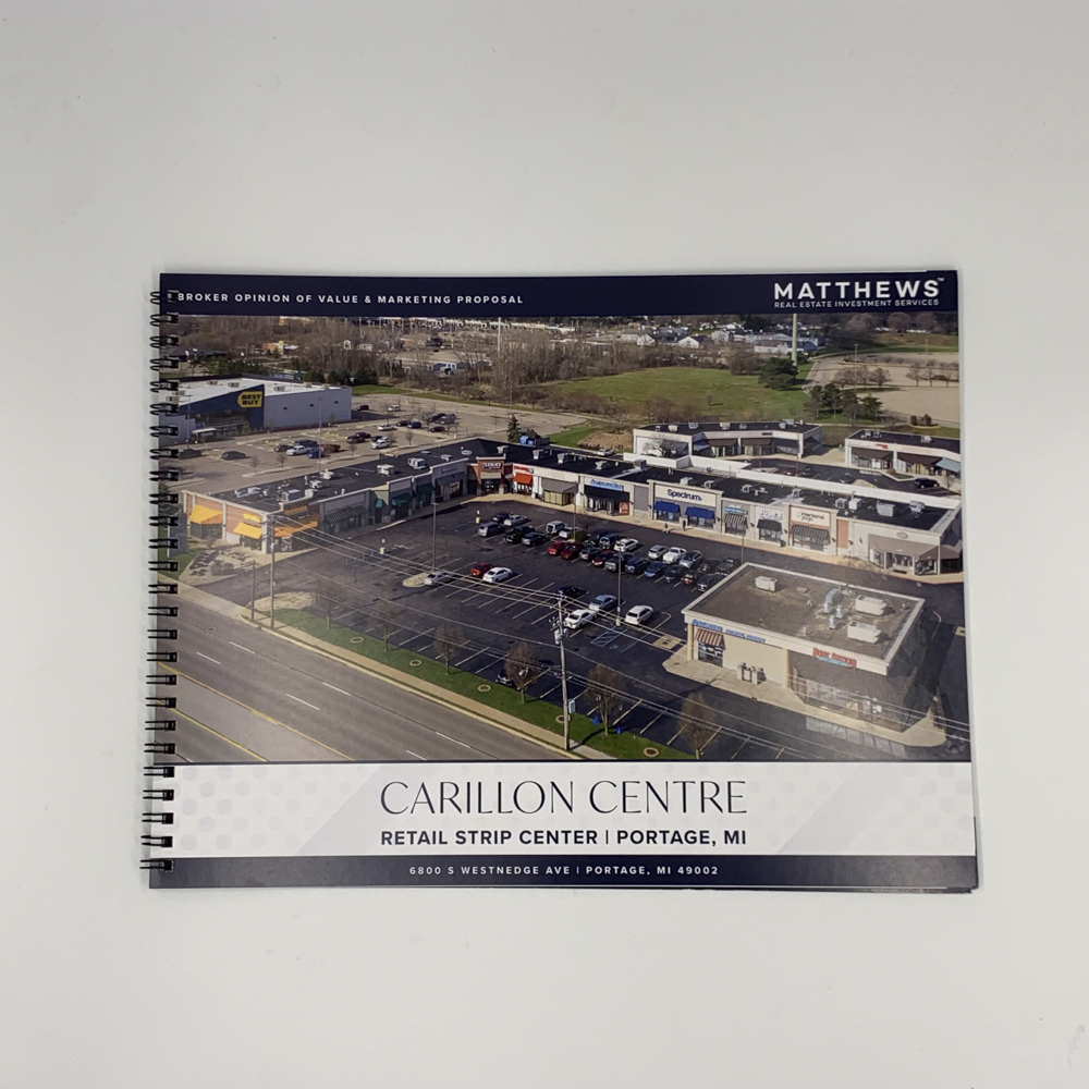 Image of the front cover of a wirebound booklet for a real estate presentation