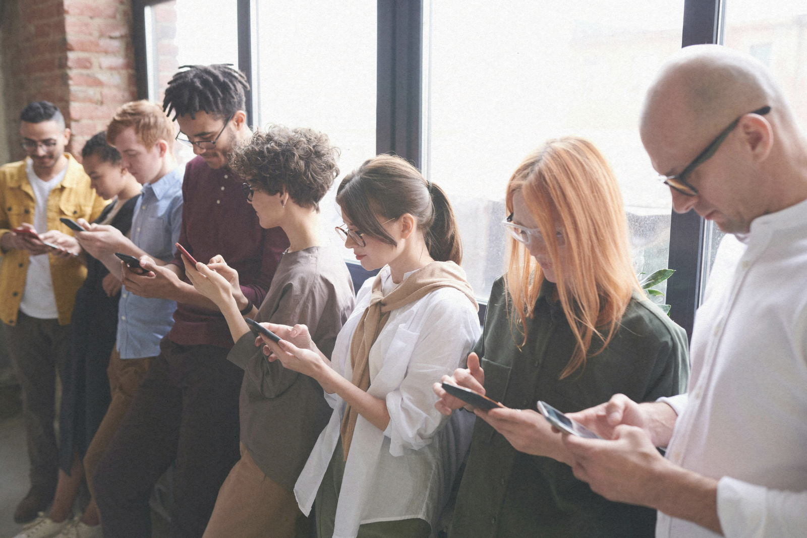 group of people on their phones