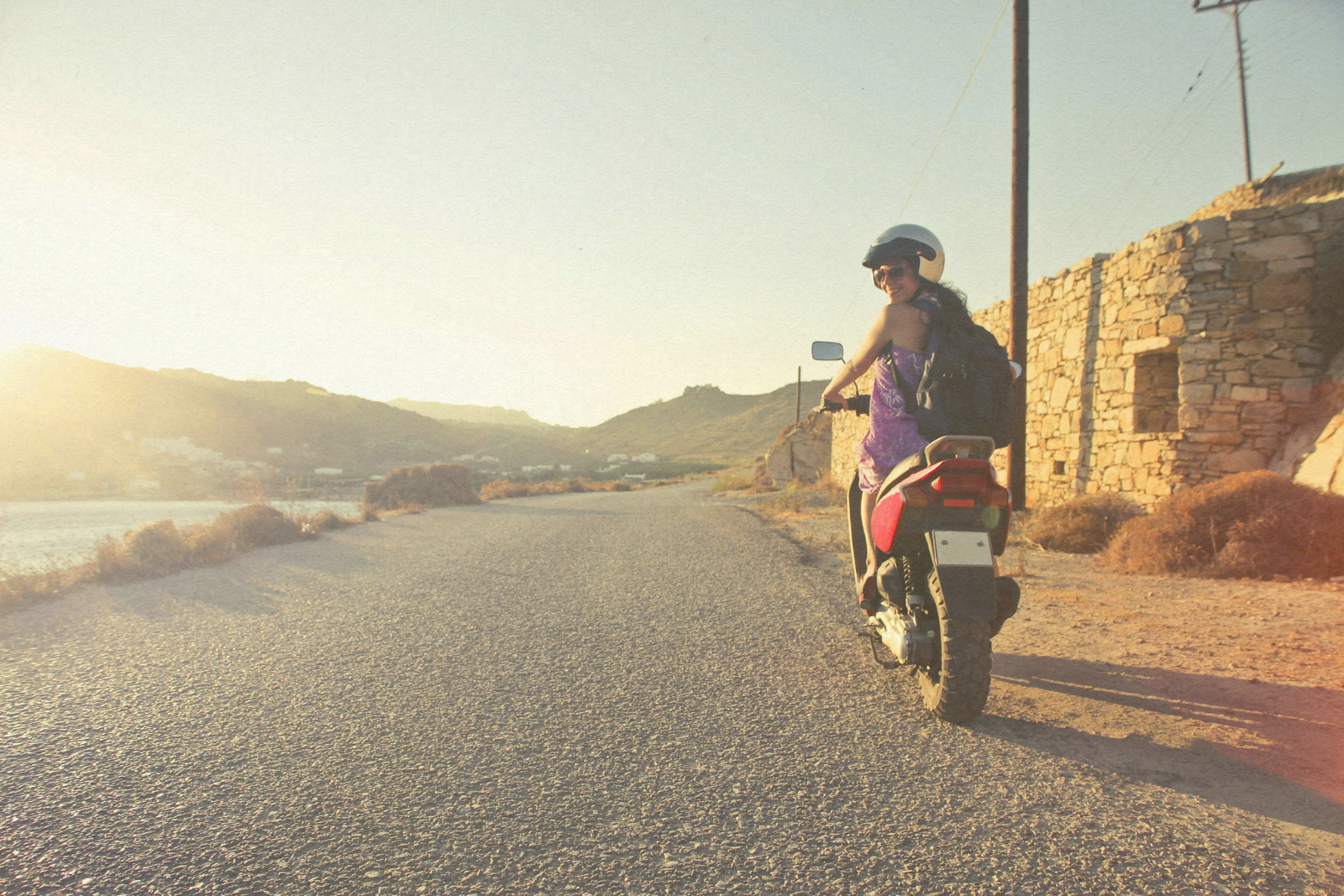 woman riding into the sunset