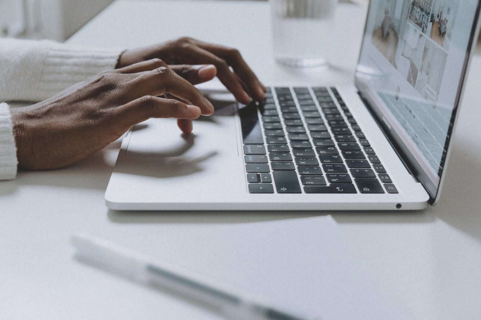 woman typing on computer 