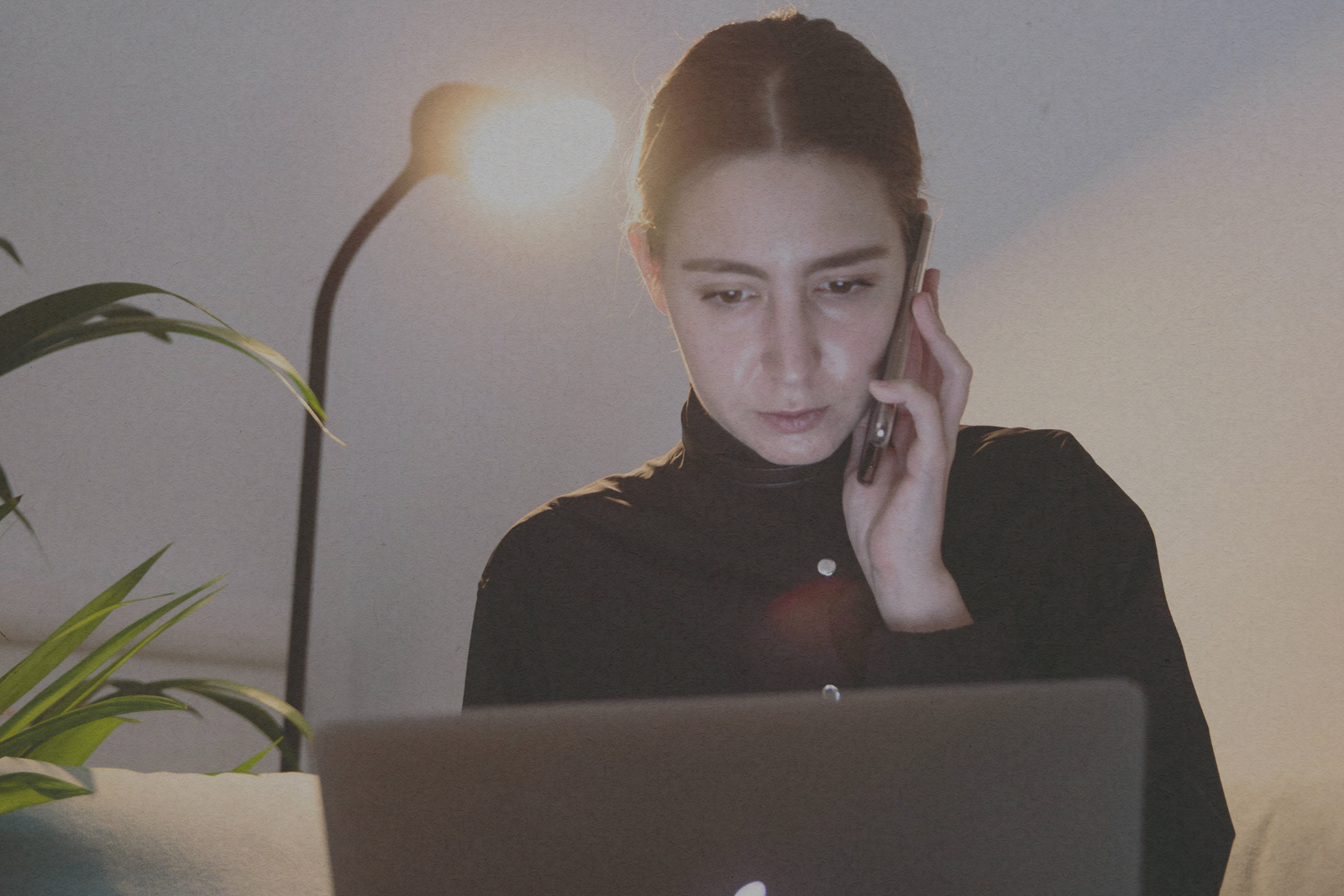 woman sitting at laptop
