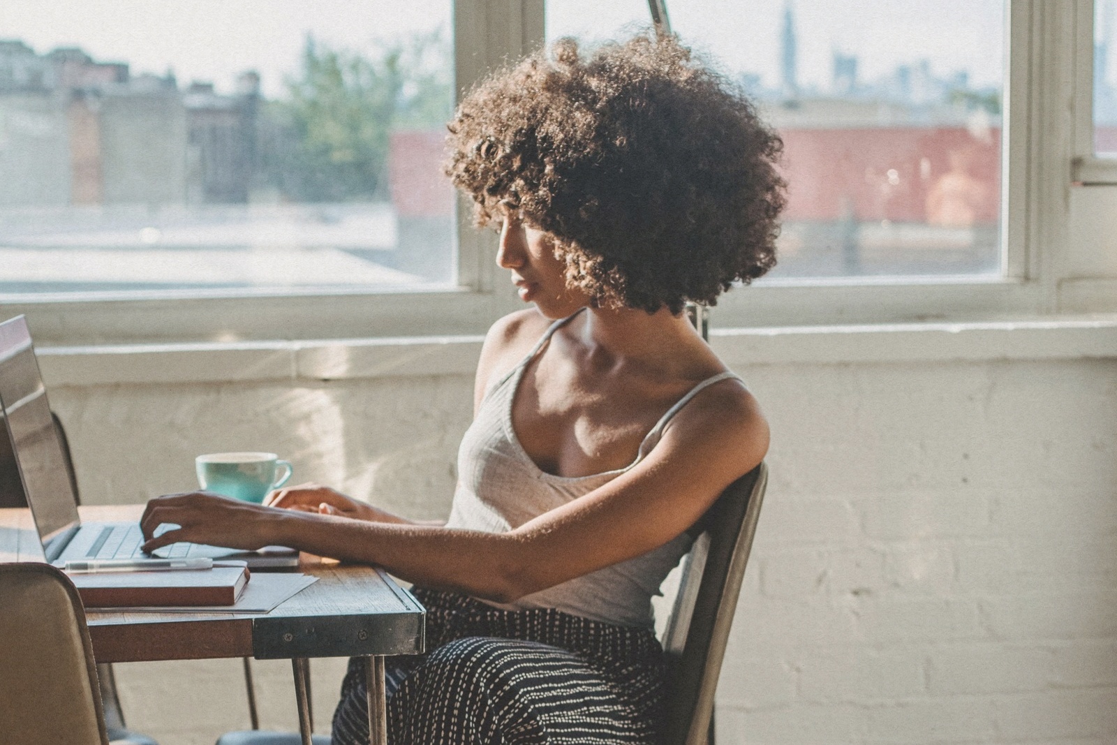woman sitting at laptop