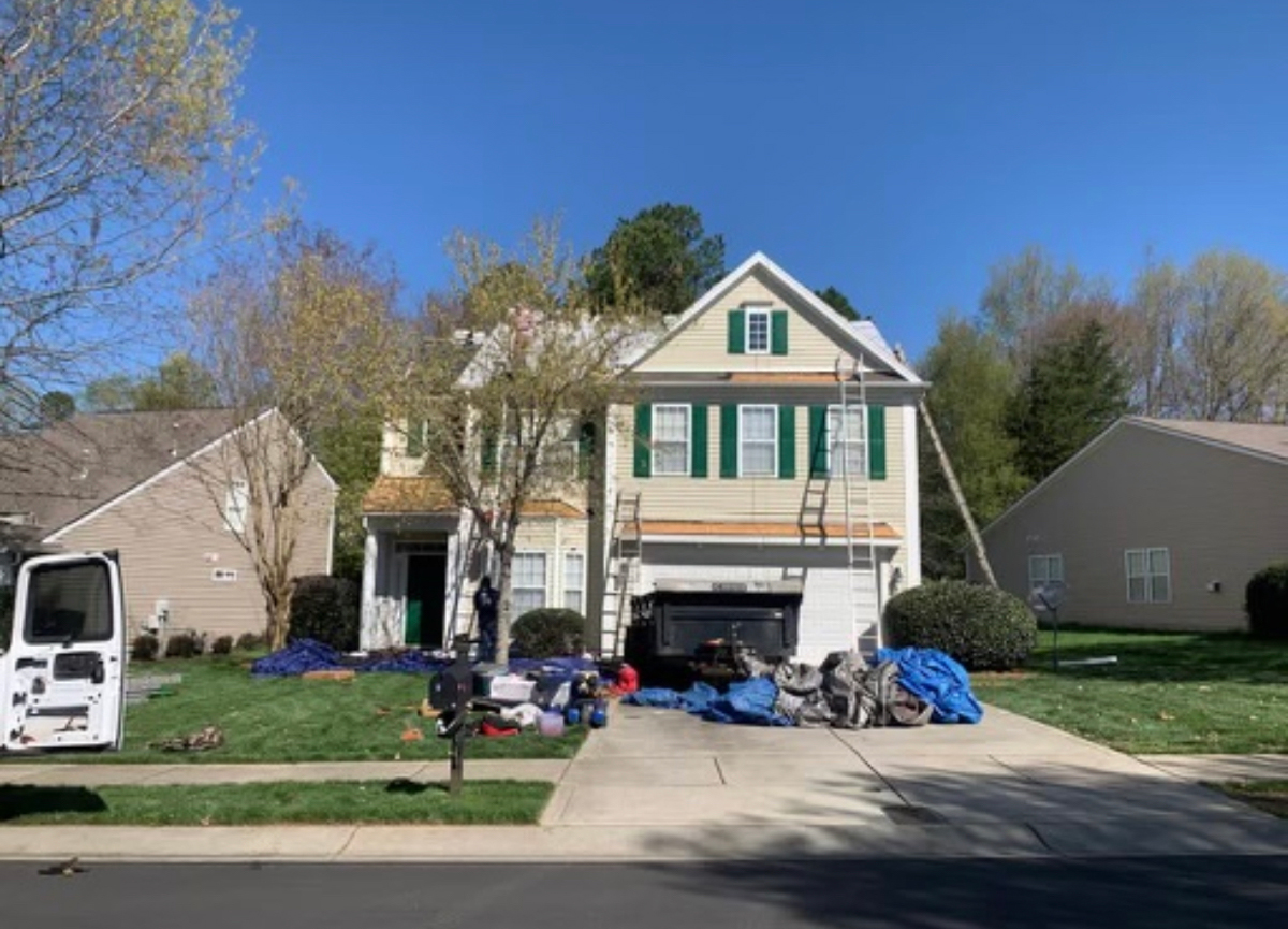 Exterior of a house with a driveway.
