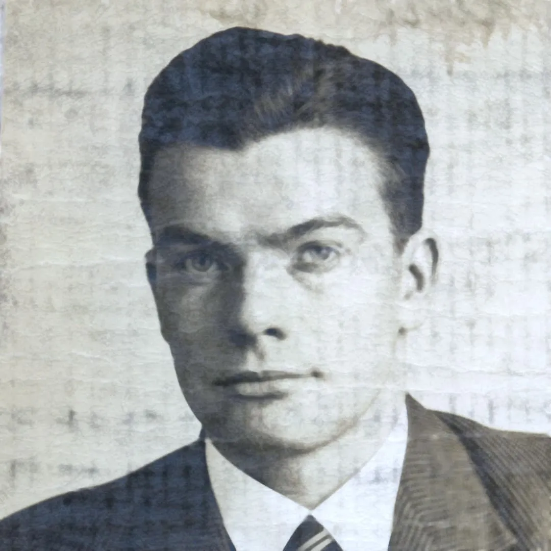 Historisches Porträtfoto eines jungen Mannes (Karl Grigo) im Anzug mit Krawatte.