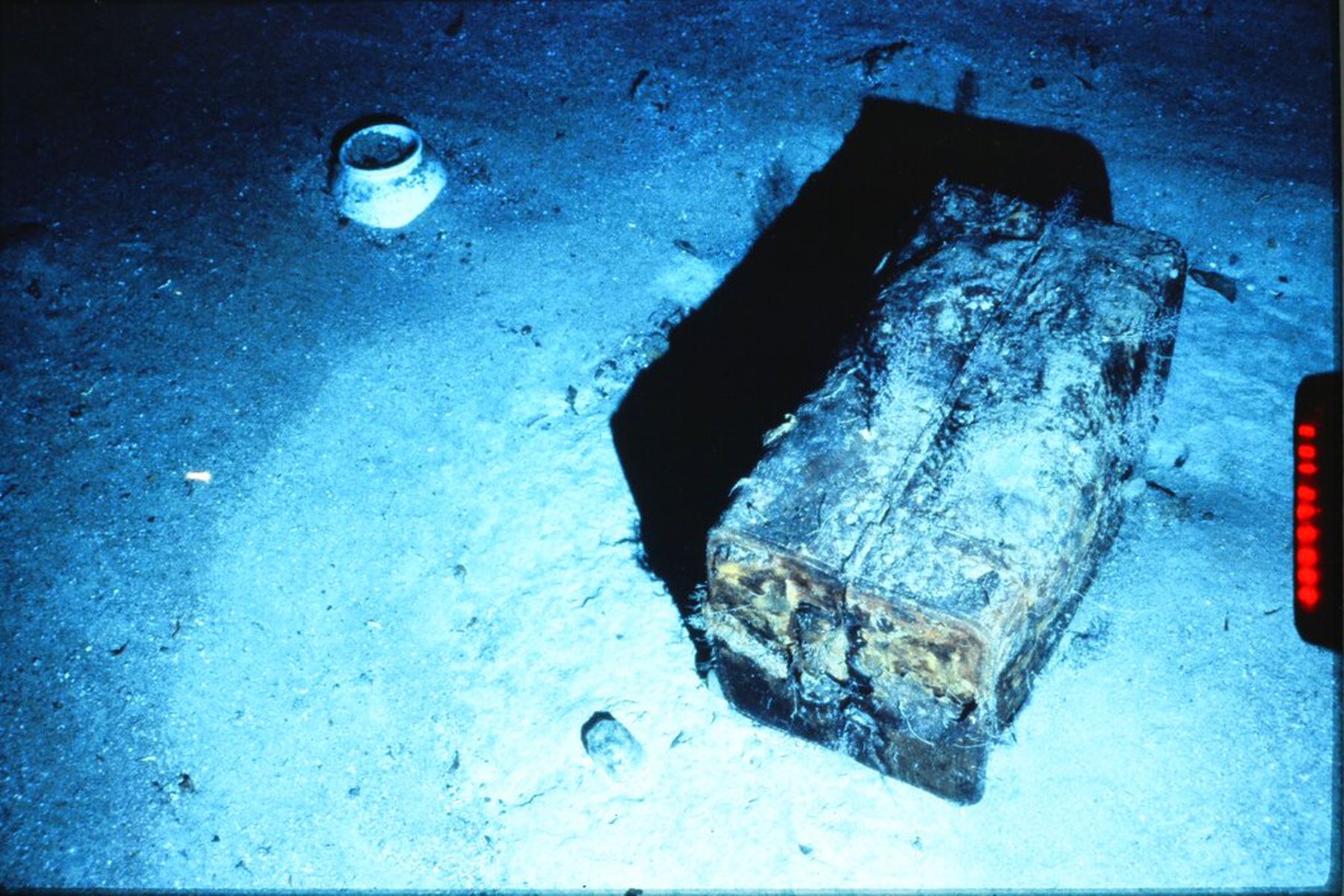 In this photo provided by the California Gold Marketing Group is the trunk belonging to S.S. Central America passengers Ansel and Adeline Easton that was discovered on the Atlantic Ocean seabed in 1990. Riches entombed in the wreckage of the pre-Civil War steamship for more than a century will begin to hit the auction block for the first time Dec. 3, 2022, when more than 300 Gold Rush-era artifacts are offered for public sale in Reno, Nev. (California Gold Marketing Group via AP)