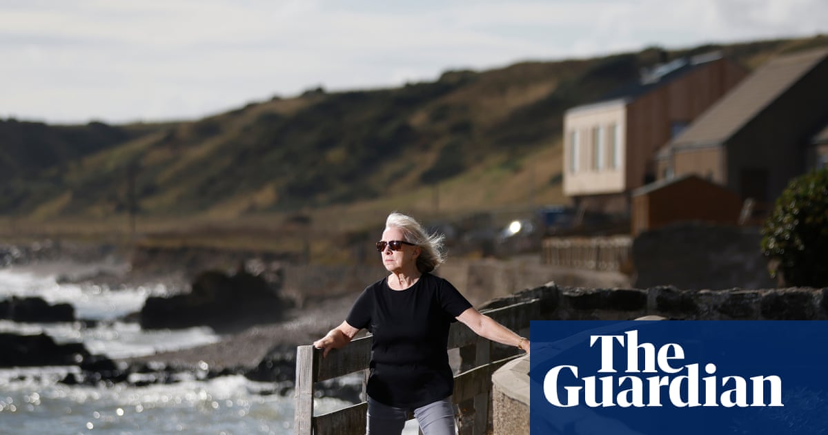 ‘It’s not just our houses’: can a Scottish village save Queen Elizabeth’s coastal path from the waves?