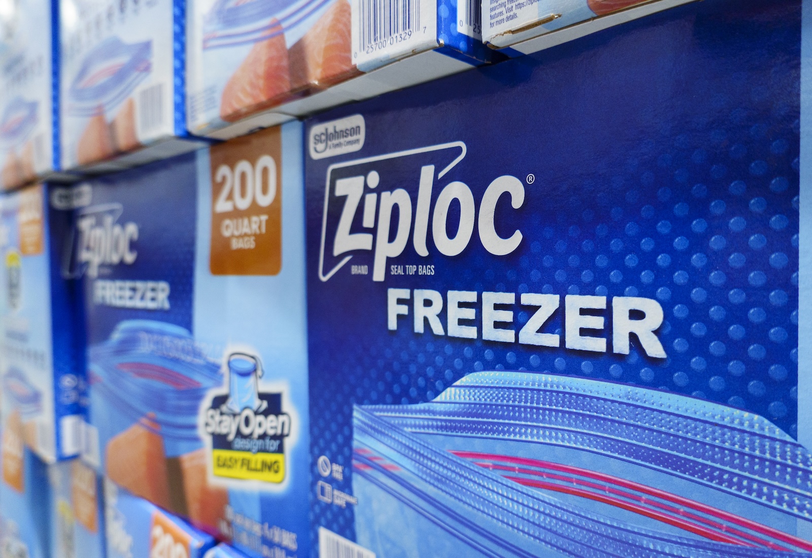 Boxes of Ziploc-brand freezer bags lining a grocery store shelf
