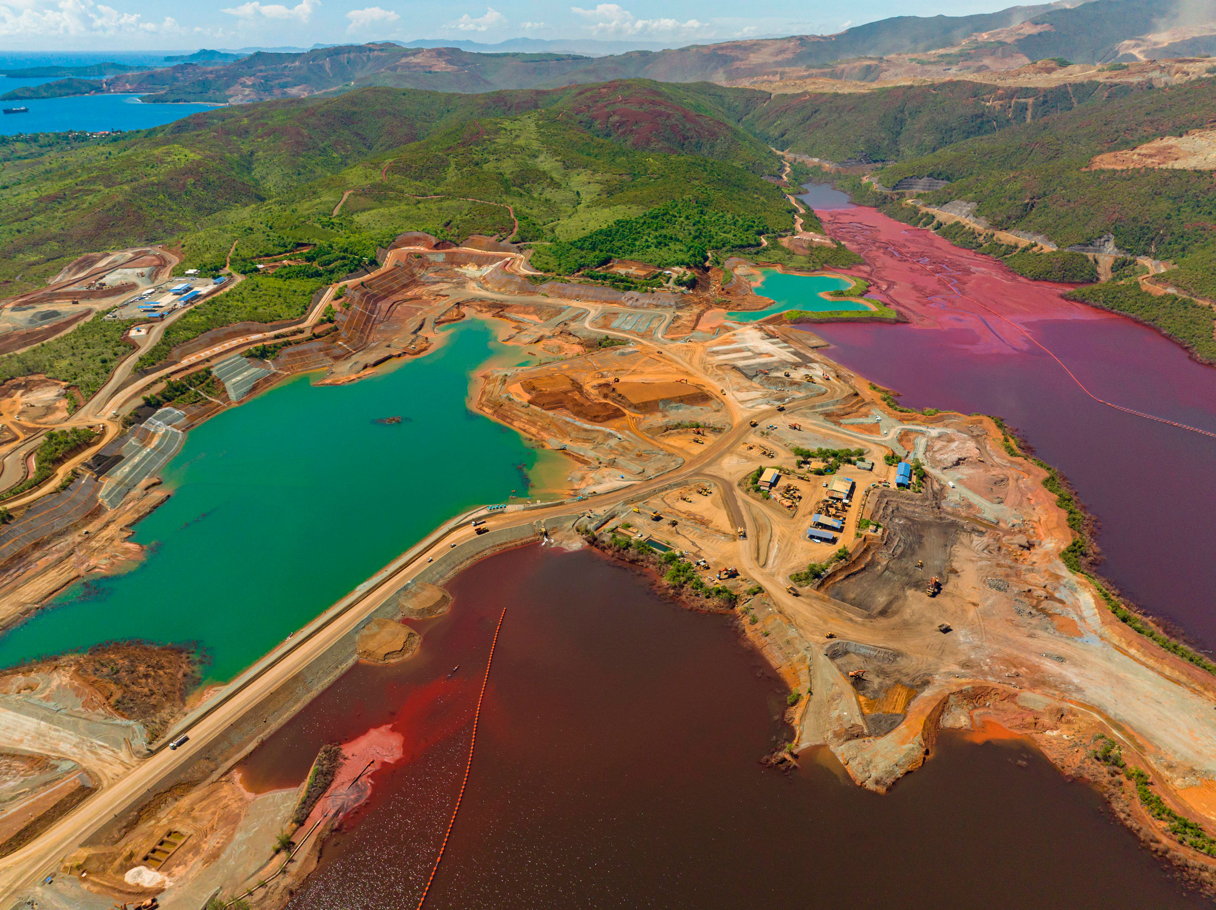 An aerial view of pit mining ponds.