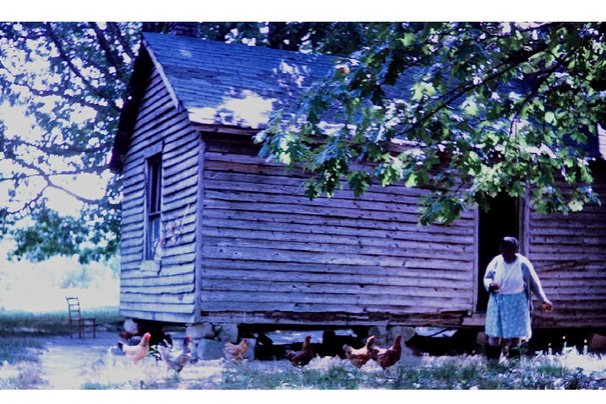 In 1963, Clayton helped drive student volunteers to isolated pockets of Warren County, to try to convince rural residents, including tenant farmers like the woman in this photo, to register to vote. “Without knowing,” Clayton said recently, “I was teaching myself that I could be engaged with people, I could lead.” (Photo courtesy of Judith Beil Vaughan)