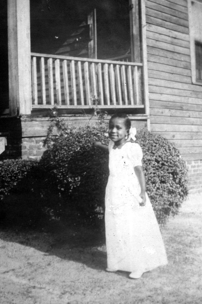 Clayton at home in Savannah, Georgia, after her kindergarten graduation. She was an introspective child, never one to raise her hand in class. But from a young age, she had an innate sense of purpose. (Photo courtesy of Eva Clayton)