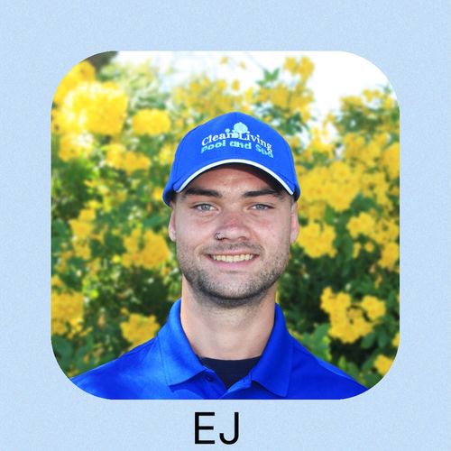 A smiling man wearing a blue Clean Living cap
