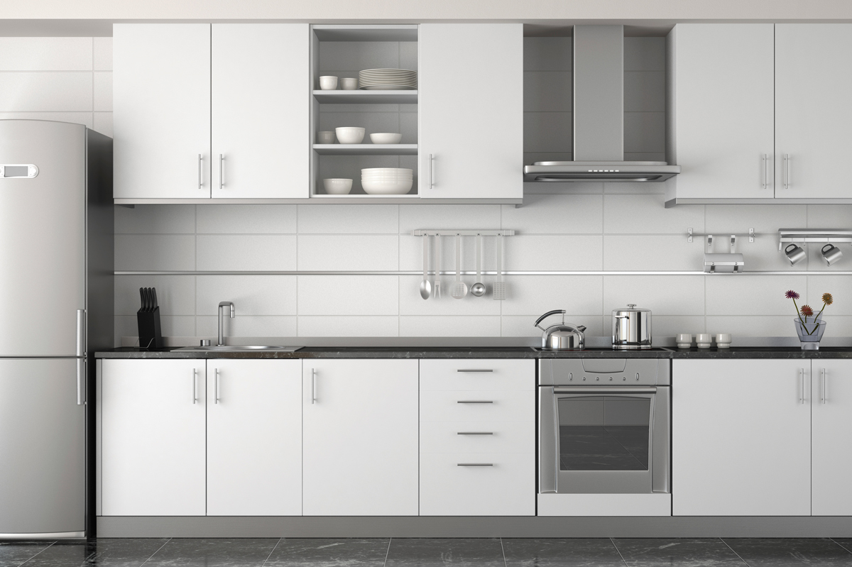White glossed cabinetry above and below stove and countertop with new silver handles