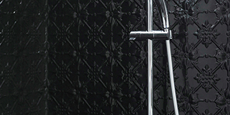 Black glossed pressed tin in bathroom shower