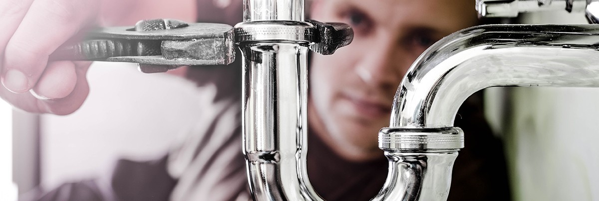 A plumber at work