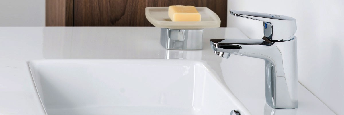 Silver coloured bathroom fixtures by Robertson