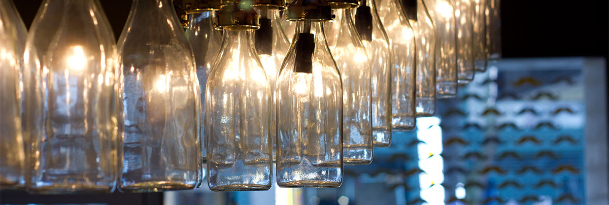 Upcycled glass bottles used for statement lighting.