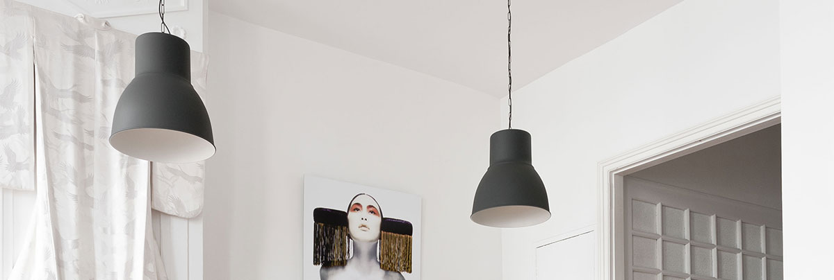 white room with black caravaggio style lights