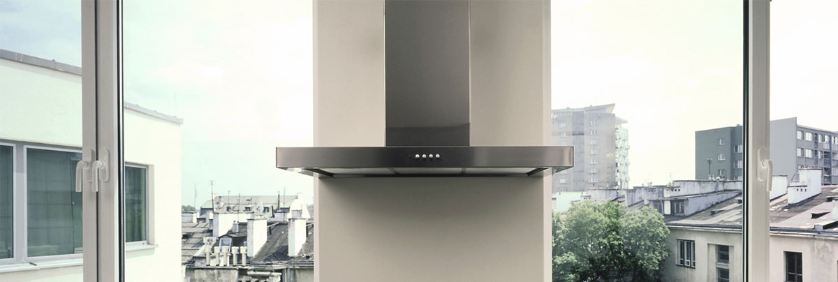Dark chrome rangehood in kitchen
