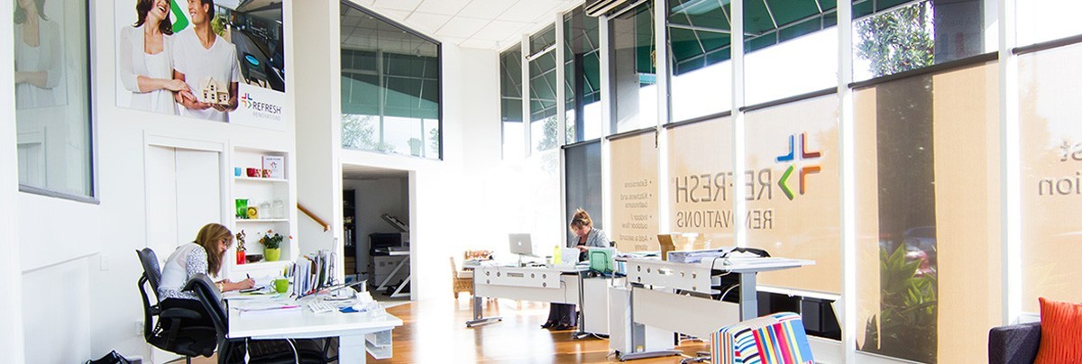 Refresh Renovations, home renovation specialists, open-plan office with two renovation consultants at their desks.