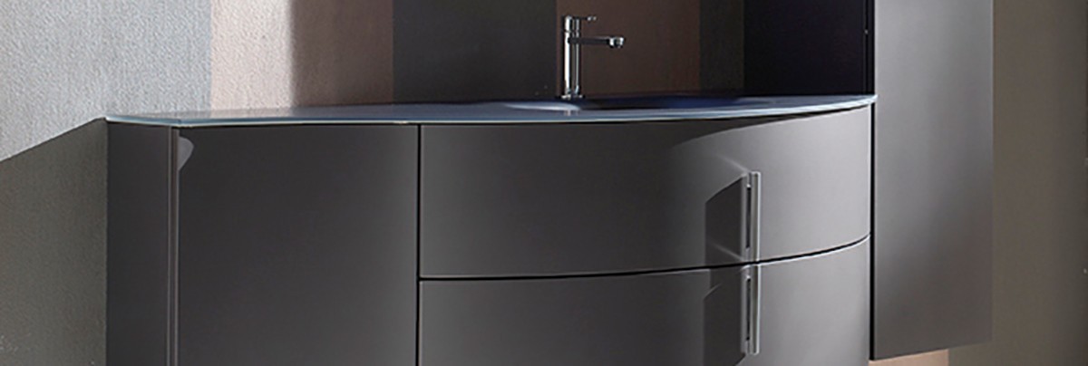 Grafite Metallizzato colour and finish vanity with glass countertop, the horizontal drawers and one vertical drawer.