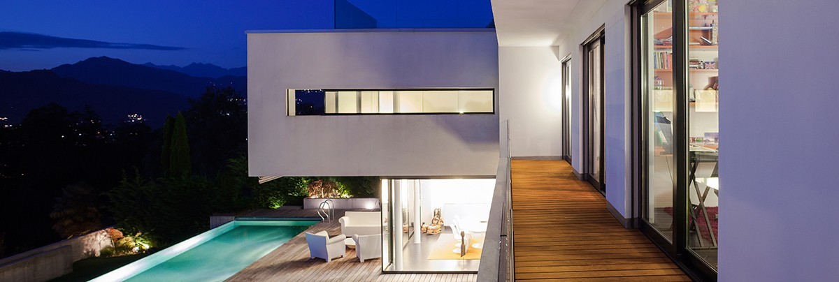 counter levered house extension extending over swimming pool