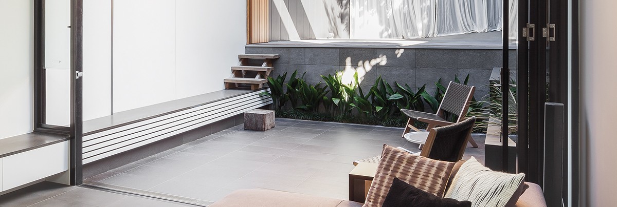A bedroom with an outdoor flow
