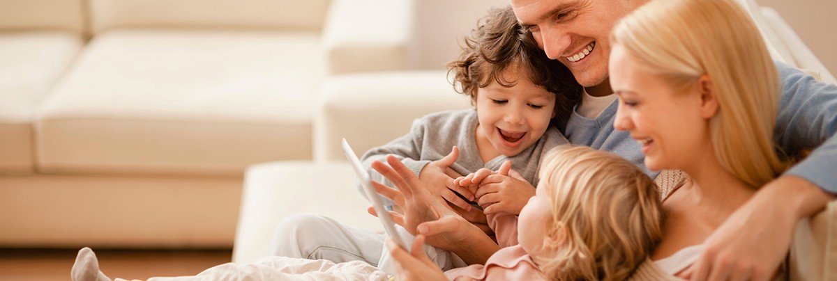 Happy and warm family in living room