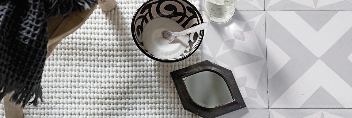 A bow and square tile