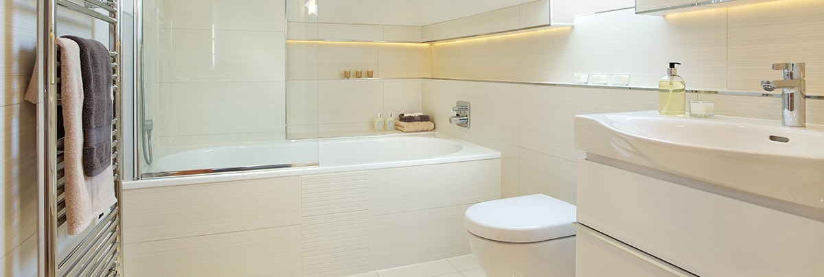 A new bathroom with bathtub and shower